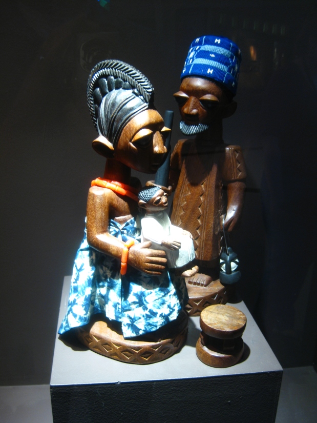 The Holy Family. Part of a crèche set carved by Yoruba artist Joseph Imale in 1974, with beadwork by Jimoh Adetoye. Collection of the SMA African Art Museum. To view the full set, see page 2 of theSMA sculpture guide.